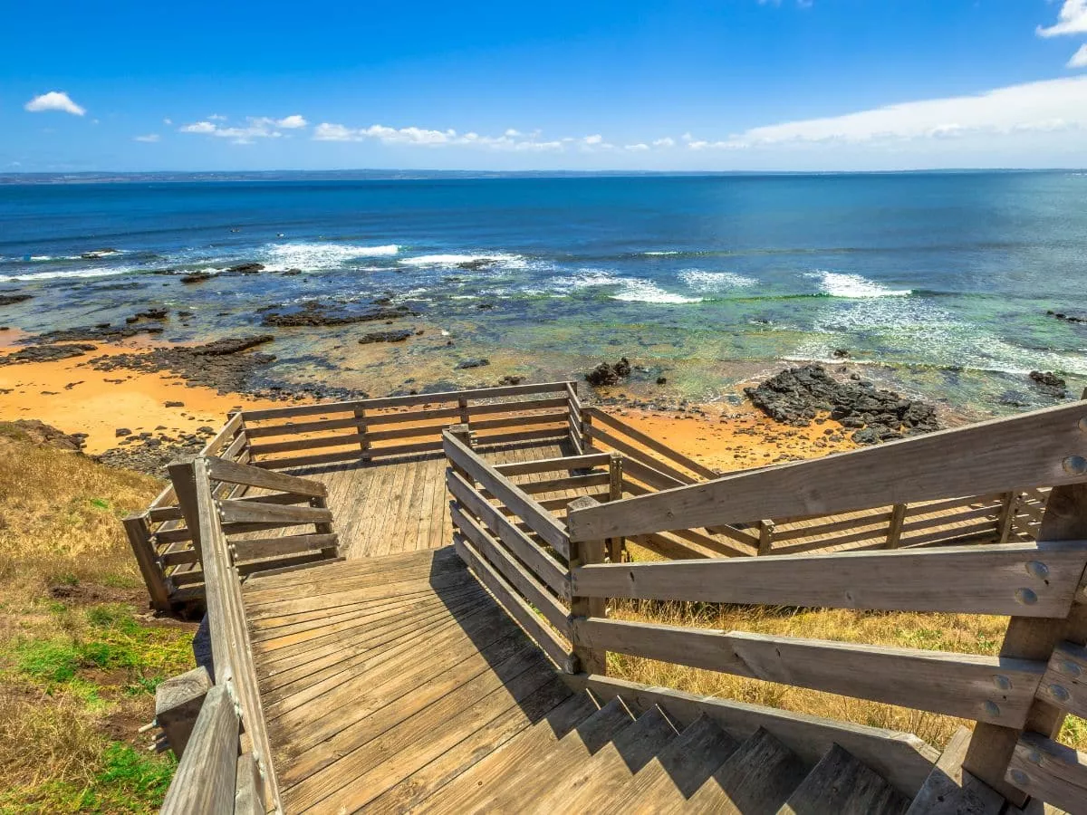 A view down some steps to a gorgeous beach on Phillip Island.